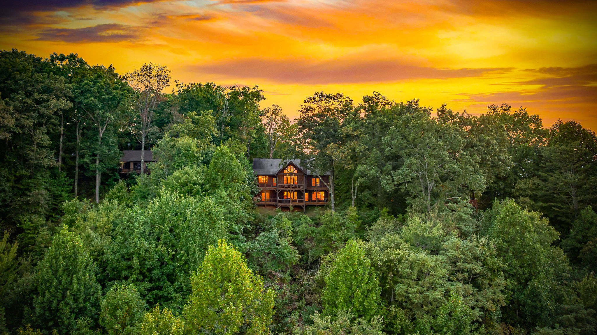 Eversky on Sunrock cabin nestled in the Blue Ridge Mountains at sunset